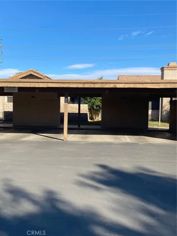 Covered carport parking with storage