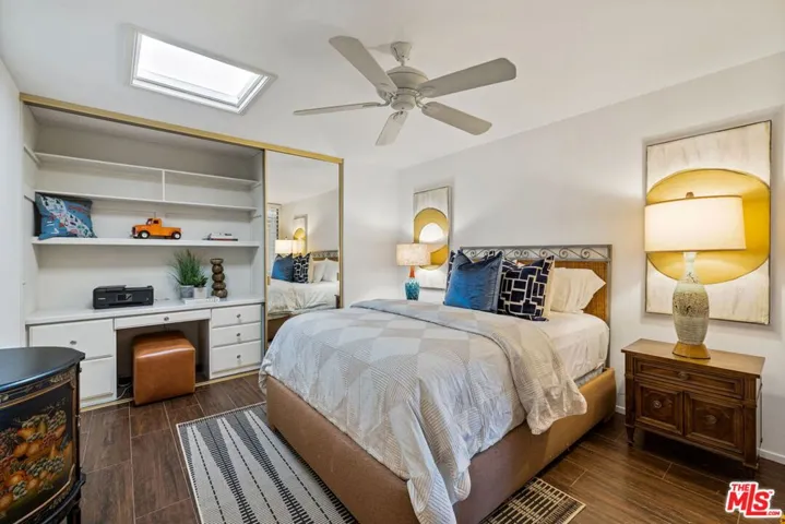Guest bedroom with built-in hidden office