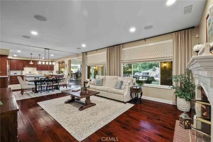 Luxury custom window draperies, shades, wood shutters, chandeliers.