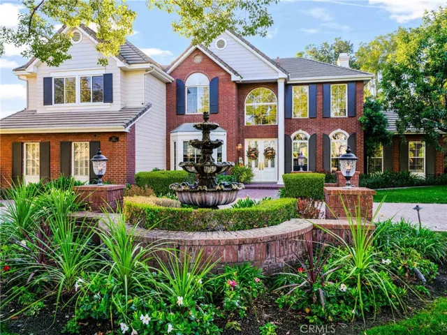 Front yard has a welcome fountain.