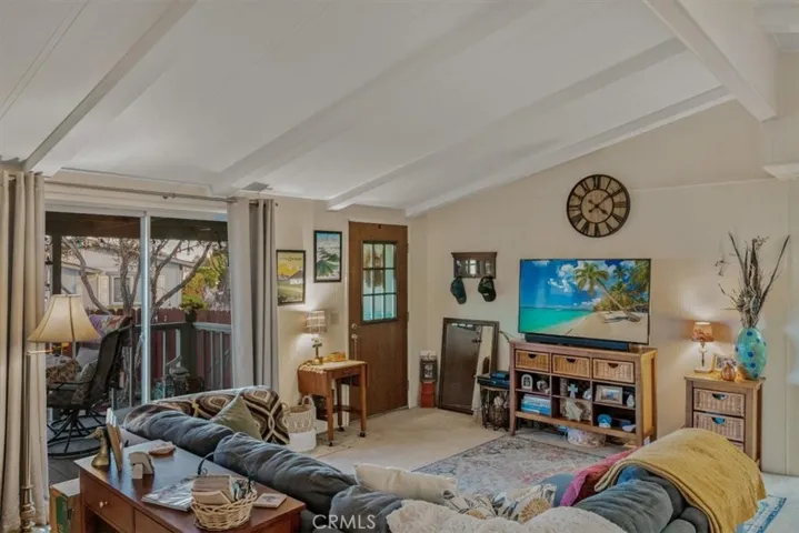 Spacious living area, slider to the deck.