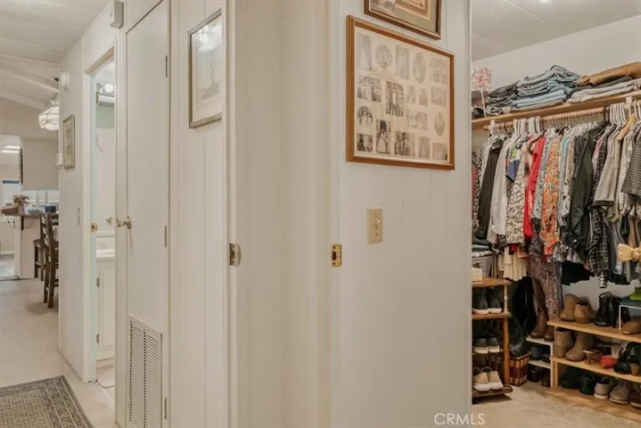 Walk-in closet with another hidden closet inside
