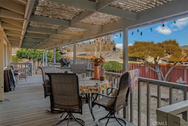 Huge deck looking over the vast front yard.  Picturesque views of the hills