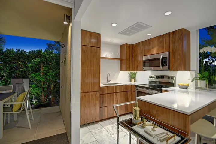 KITCHEN TO BACK PATIO NIGHT MLS