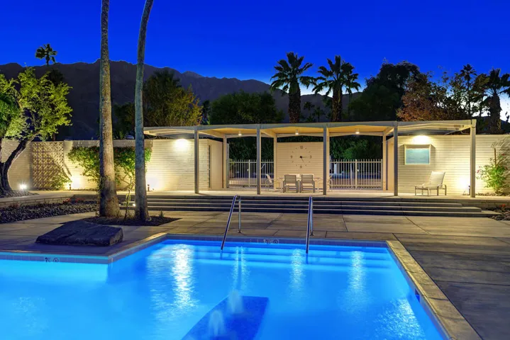 POOL TO CLOCK AND MOUNTAINS NIGHT MLS