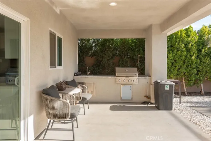 Covered patio with built-in BBQ