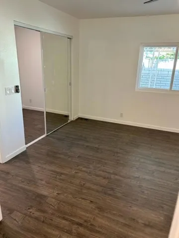 master bedroom with large walk in closet
