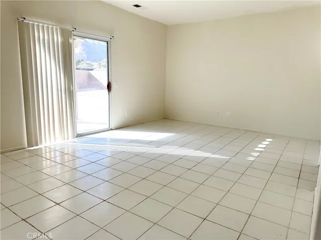 Primary bedroom with sliding door access to​​‌​​​​‌​​‌‌​​‌​​​‌‌​​​‌​​‌‌​​‌‌​​‌‌​​​​ backyard
