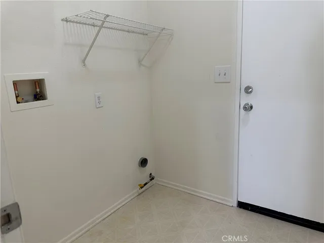 Laundry room with full-size hook-ups.