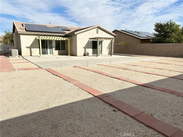 Wide open space for you to customize for your favorite backyard pastimes and a view of your FULLY PAID SOLAR PANELS!