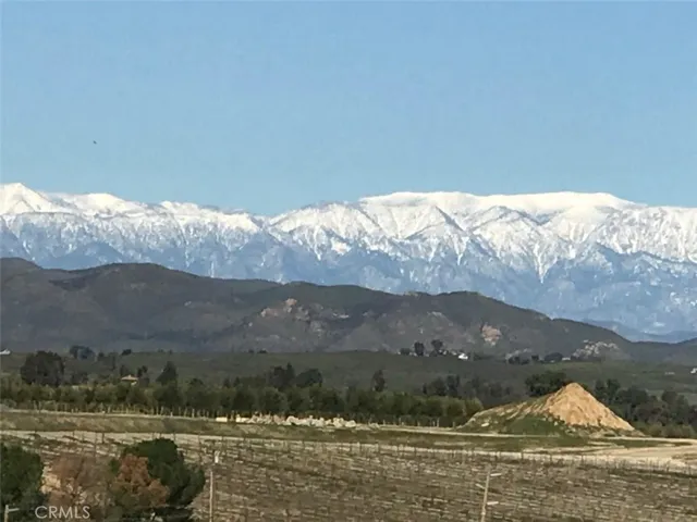 WINTER  TIME  SNOW  COVERED  MTS .