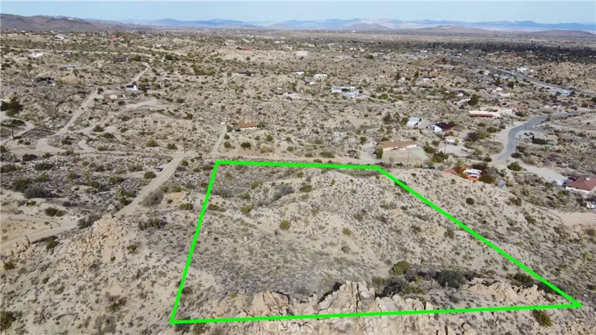 Aerial view looking north with approximate parcel lines