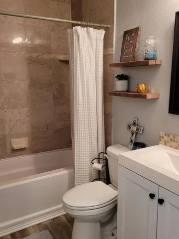 Guest bath with stone tile shower