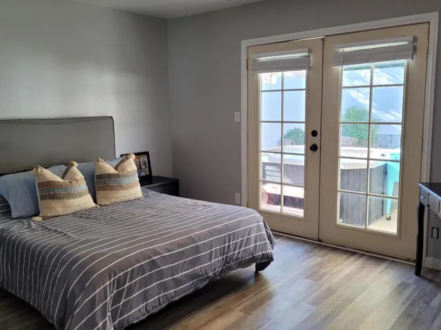 Primary bedroom with French doors