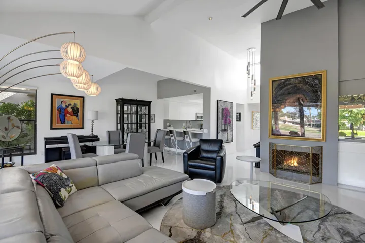 LIVING WITH FIREPLACE ANGLED TO DINING A