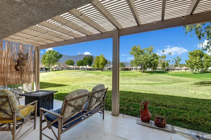 BACK TRELISSED PATIO OUT TO VIEW' MLS