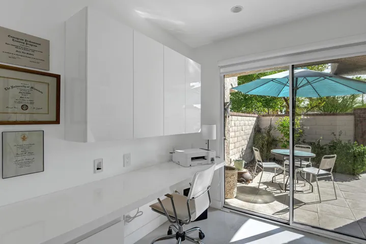 BREAKFAST ROOM DESK TO ENTRY COURTYARD M