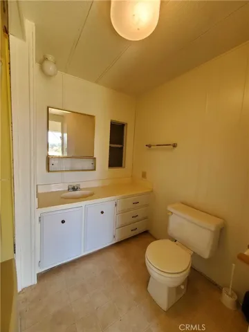 Bath:  Renovation included new flooring and toilet.