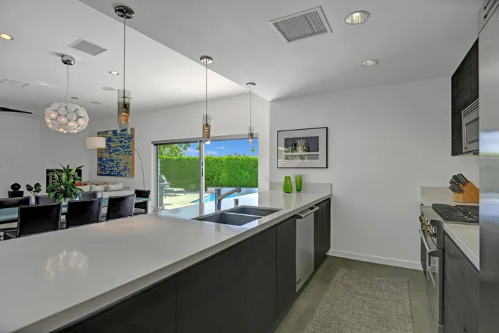 KITCHEN ANGLED THROUGH TO POOL MLS