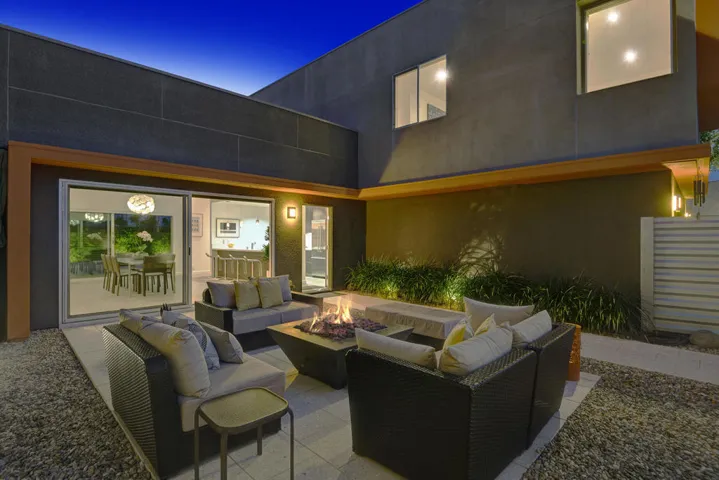 ENTRY COURTYARD TO FRONT ENTRY NIGHT MLS