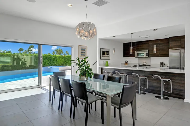 DINING ROOM TO KITCHEN AND POOL MLS
