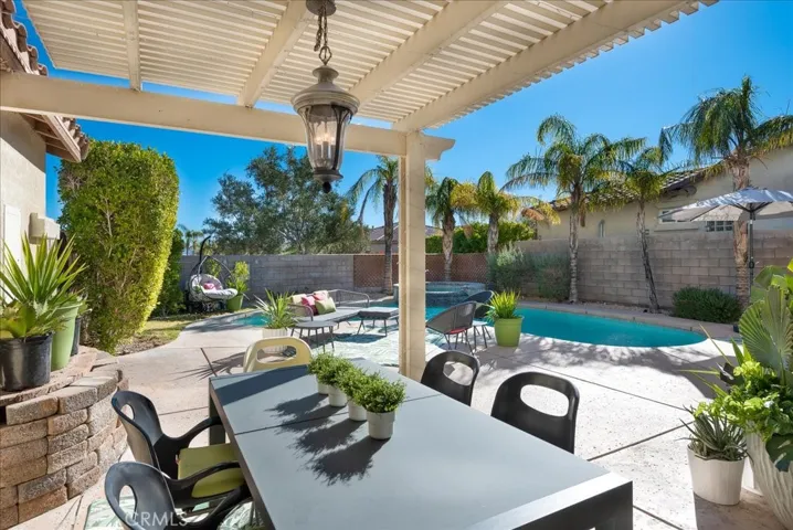 Covered Outdoor dining. Another bonus to this pool sanctuary.