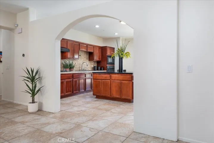 An arched entry to the kitchen. (from the living room)