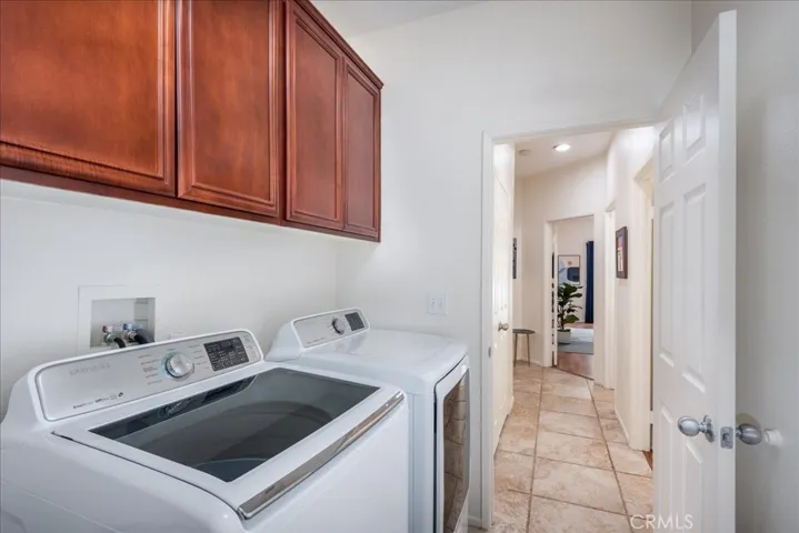 An in house laundry that leads to the attached garage.