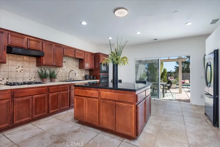 The kitchen leads out to the pool - Ideal for entertaining and El Fresco dining.