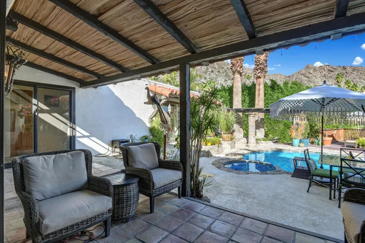BACK COVERED PATIO REVERSE TO POOL YARD