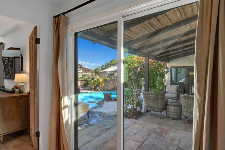 POOL VIEW FROM HALL TO PRIMARY MLS