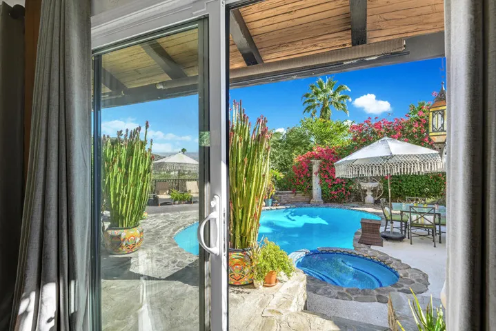 PRIMARY BEDROOM POOL AND SPA VIEW MLS