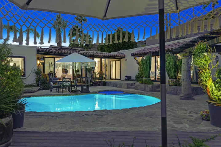 POOL PATIO TO POOL AND HOUSE NIGHT MLS