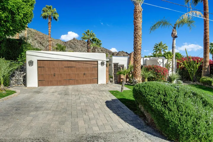 FRONT OF HOUSE WITH GARAGE MLS