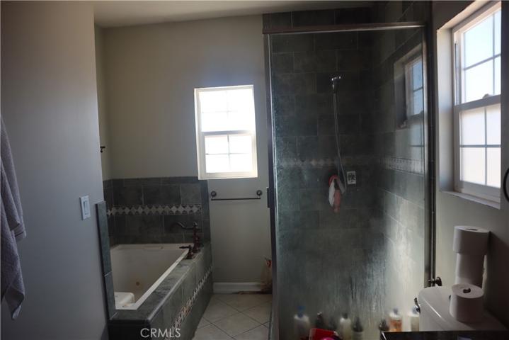 Second unit master bedroom shower and jacuzzi