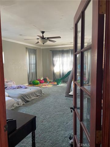 Second unit exiting the bathroom of master bedroom