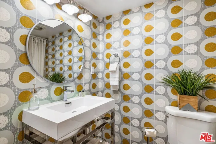 Guest bathroom, bathtub with jets off camera right