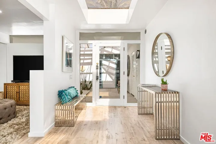 Main entry lit by 3 skylights