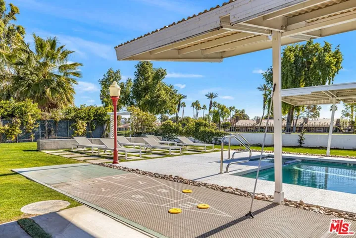 Shuffle board and pool off the master patio