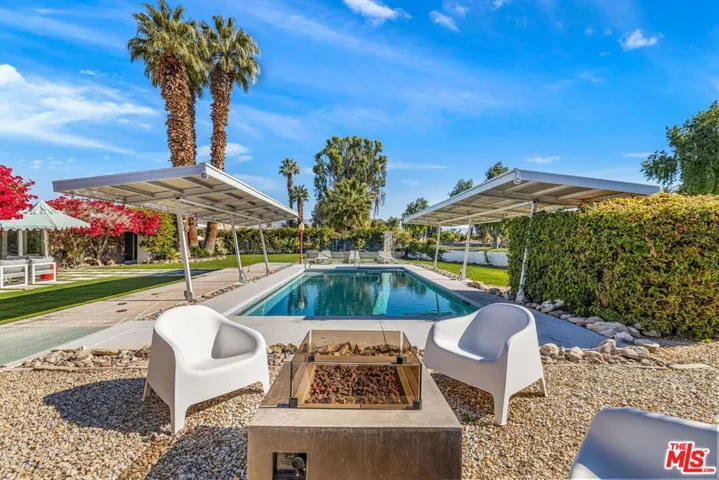View of the pool from the fire pit