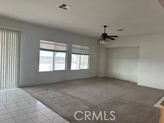 Spacious den overlooks backyard