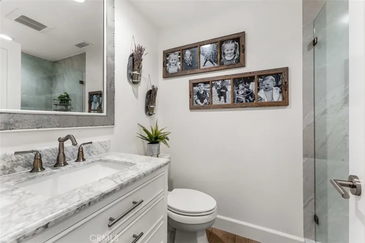 Bathroom #3. This a guest bathroom located off the hallway.