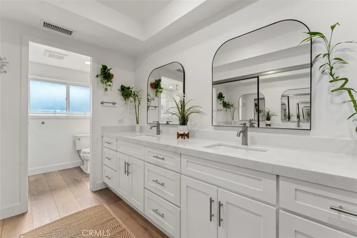 Dual sinks in the master bathroom.