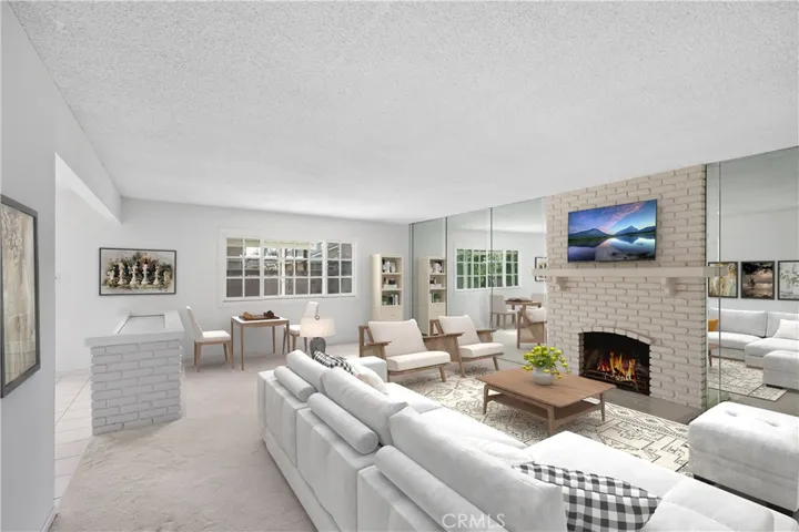 Living Room with cozy Fireplace (Virtually Staged)