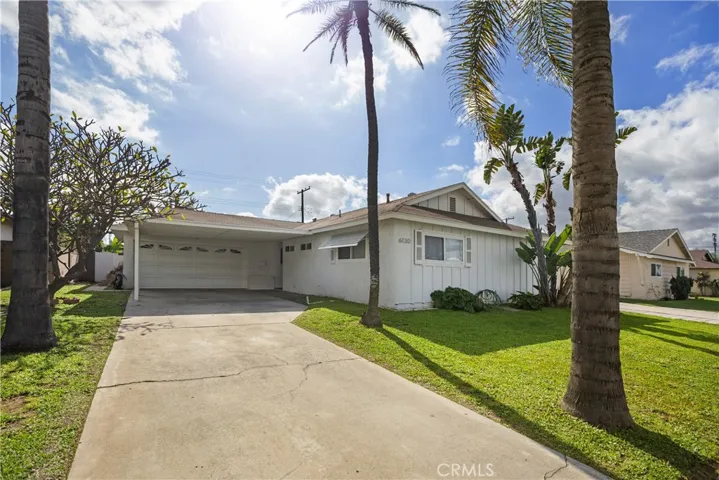 2 Car Attached Garage w/direct access & Additional Covered Parking