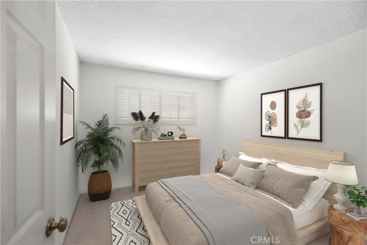 2nd Bedroom with wood shutters (Virtually Staged)