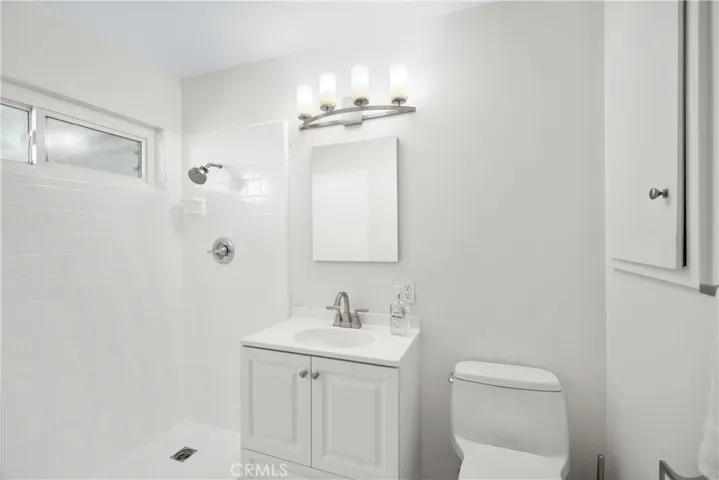 Primary Suite updated bathroom with walk-in shower