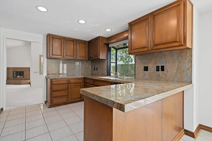 Granite Counters and Plenty of Cabinetry