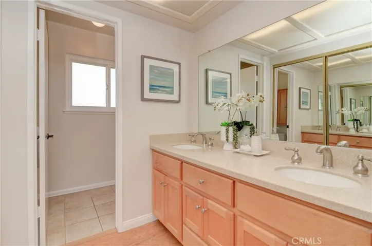 Master bath has separate vanity/dressing area with dual sinks.