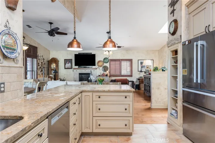 Beautiful Tuscany Style Kitchen with Stainless Steel Appliances & Granite Countertops & Walk-in Pantry